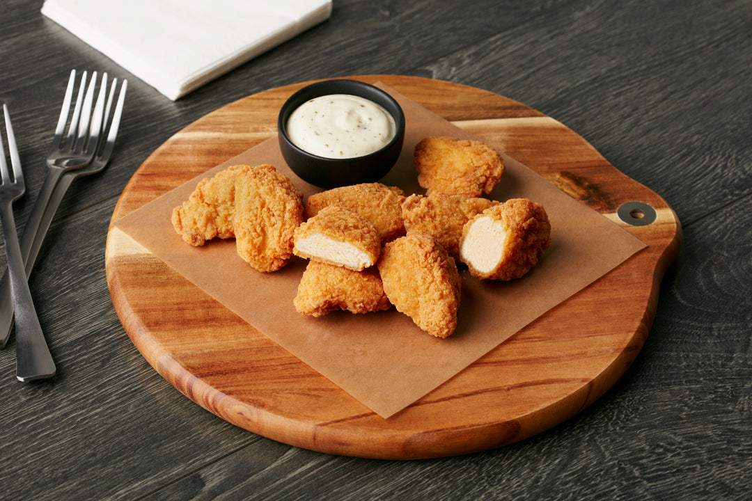 13462 - Bouchées de poitrine de poulet assaisonnées, panées et cuites - Congelées