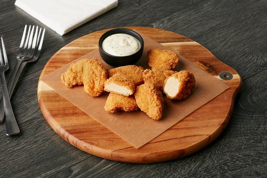 13462 - Bouchées de poitrine de poulet assaisonnées, panées et cuites - Congelées